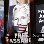 Menschen, die für Julian Assange protestieren