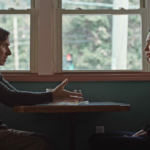 Tim-Roth-sitting-across-from-Rebecca-Hall-in-a-diner-in-Resurrection