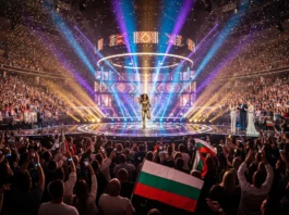 Performer on a vibrant stage with beams of light and Bulgarian flags at the Eurovision Song Contest 2026.